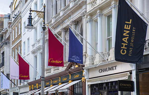 London, UK - August 13, 2019: Old Bond street view with flags of